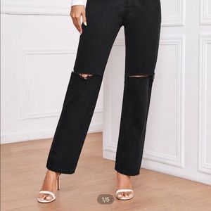 High waisted black straight ripped pants